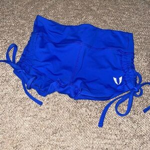 Firm abs blue booty shorts with ties on the side